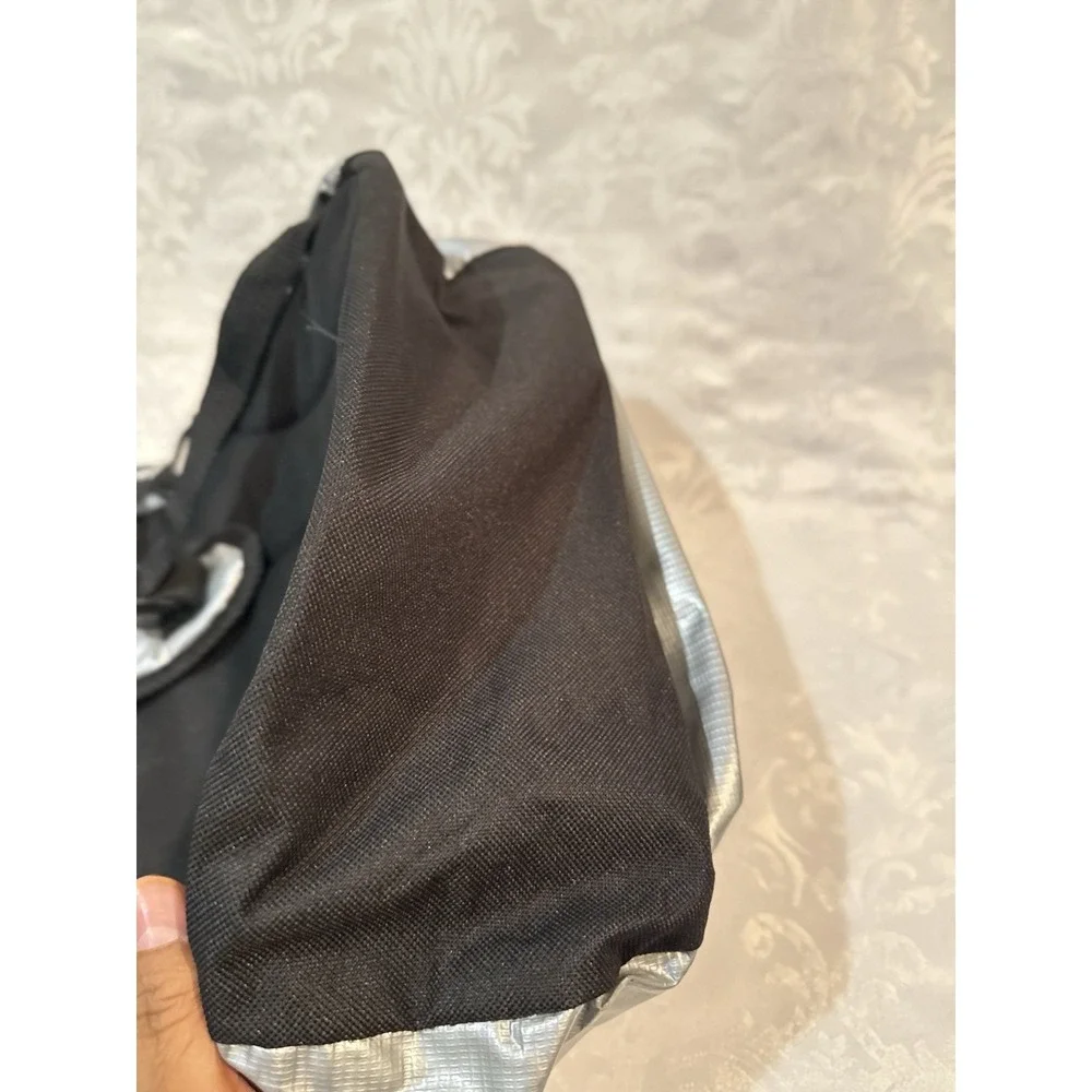 Ecko by Marc Ecko silver metallic backpack iconic black rhino logo front pocket